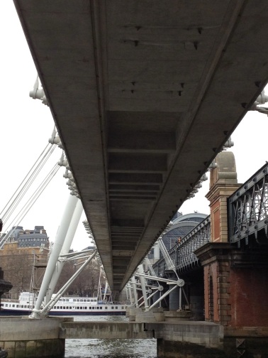 the under side of the hungerford bridge 